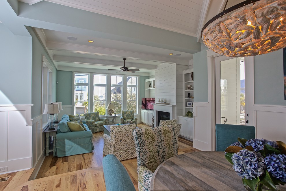 Example of a beach style family room design in Charleston