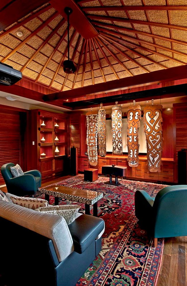 This is an example of a world-inspired open plan games room in Hawaii with medium hardwood flooring.