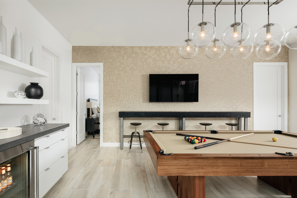 Inspiration for a large traditional enclosed games room in Phoenix with a game room, beige walls, light hardwood flooring, no fireplace, a wall mounted tv and beige floors.
