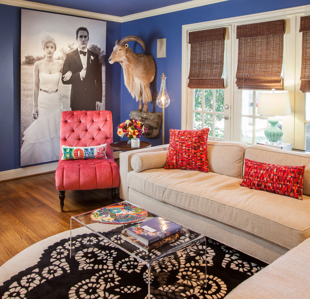 Family room - traditional family room idea in Houston with blue walls