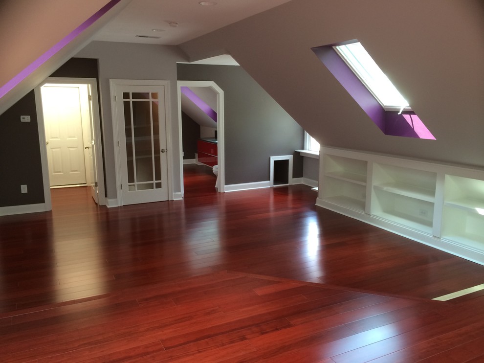 Inspiration for a traditional mezzanine games room in Raleigh with multi-coloured walls and dark hardwood flooring.
