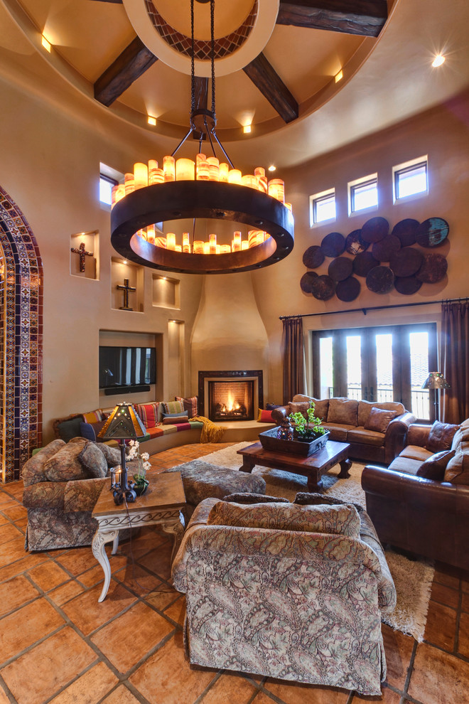 Tuscan family room photo in Other
