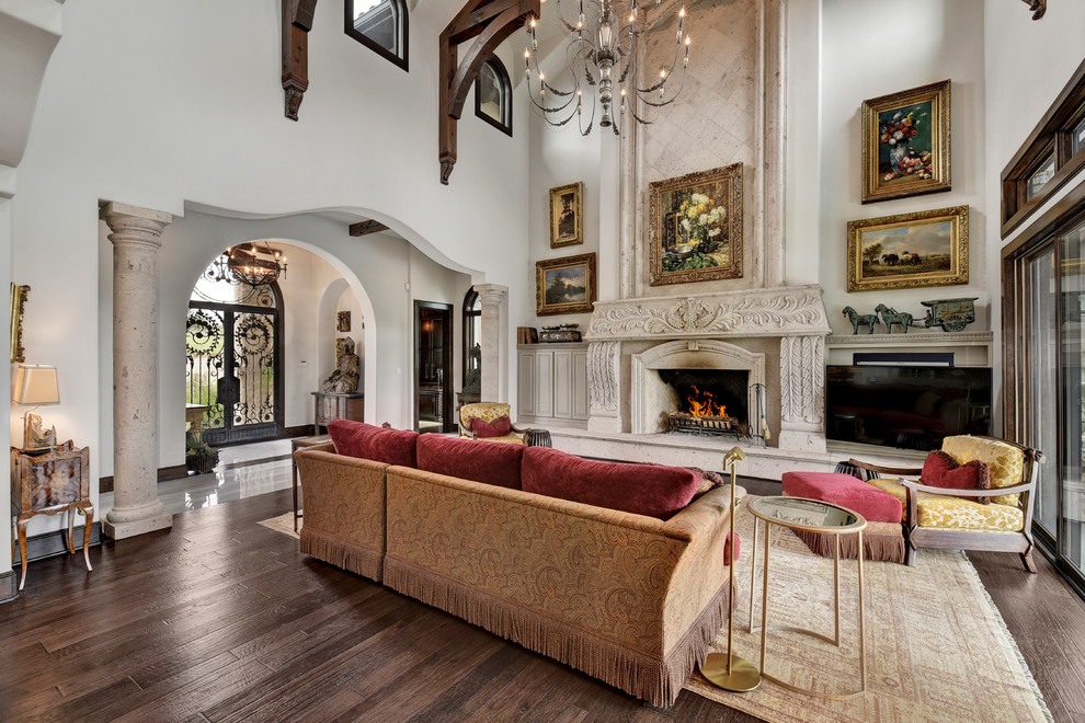 Example of a tuscan family room design in Austin