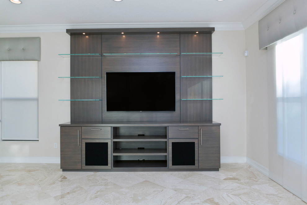 Modern enclosed games room in Miami with white walls, marble flooring and a wall mounted tv.