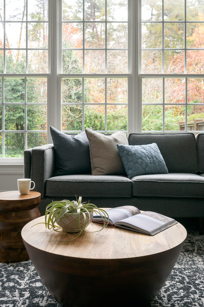 Idee per un soggiorno minimalista di medie dimensioni e aperto con pareti grigie, pavimento in gres porcellanato e pavimento grigio