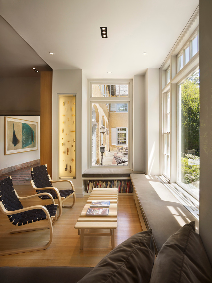 Family room - contemporary medium tone wood floor family room idea in Philadelphia