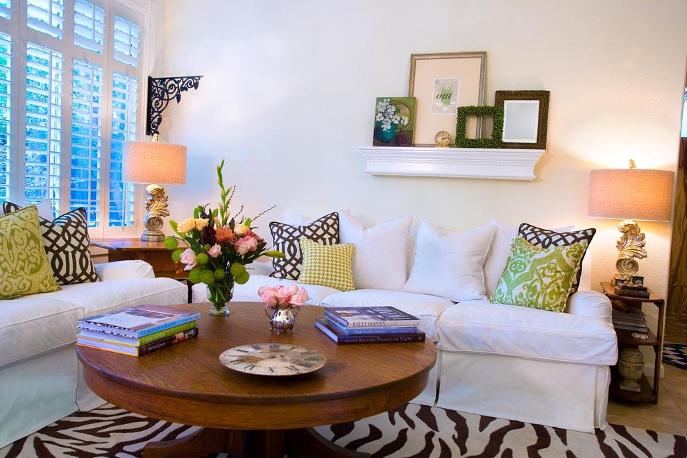 Elegant family room photo in Other with white walls