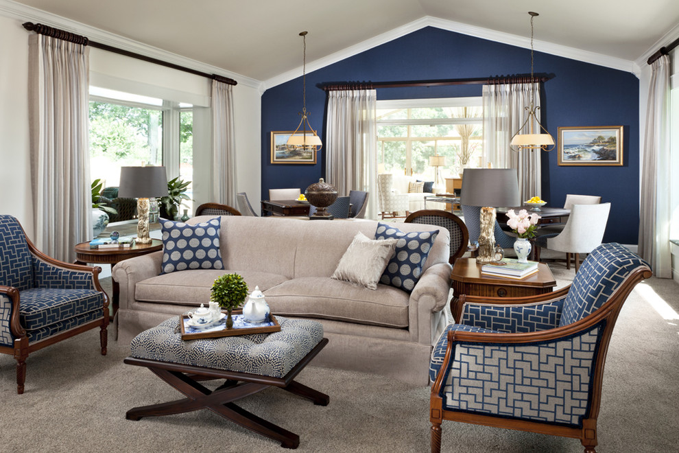 Inspiration for a mid-sized timeless open concept carpeted family room remodel in Charlotte with multicolored walls