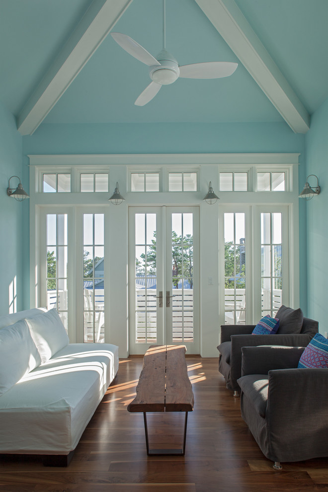 Contemporary games room in Miami with blue walls.