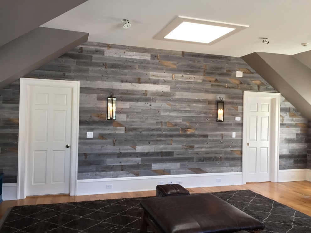 Family room - large rustic light wood floor family room idea in New York with gray walls and no tv