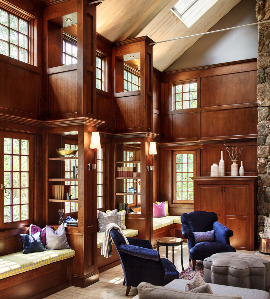 Inspiration for a large timeless open concept light wood floor family room library remodel in Boston