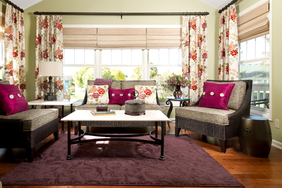 Family room - traditional medium tone wood floor family room idea in Minneapolis with green walls and no tv