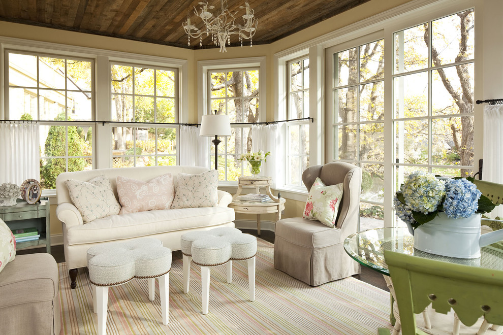 Family room - mid-sized shabby-chic style family room idea in Minneapolis with yellow walls, no fireplace and no tv