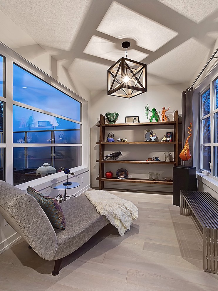 Inspiration for a small transitional family room library remodel in Calgary with no fireplace and no tv