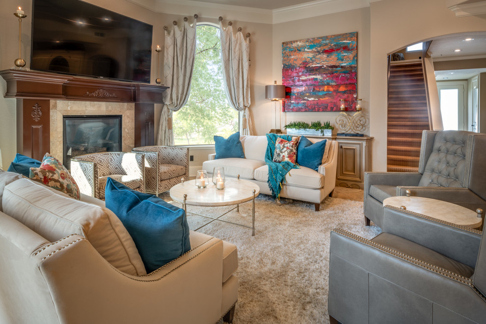 Large classic open plan games room in Houston with beige walls, ceramic flooring, a ribbon fireplace, a wooden fireplace surround, a wall mounted tv and beige floors.