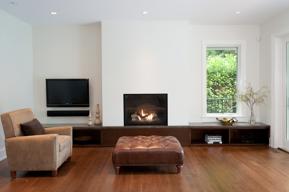 Example of a transitional family room design in Vancouver