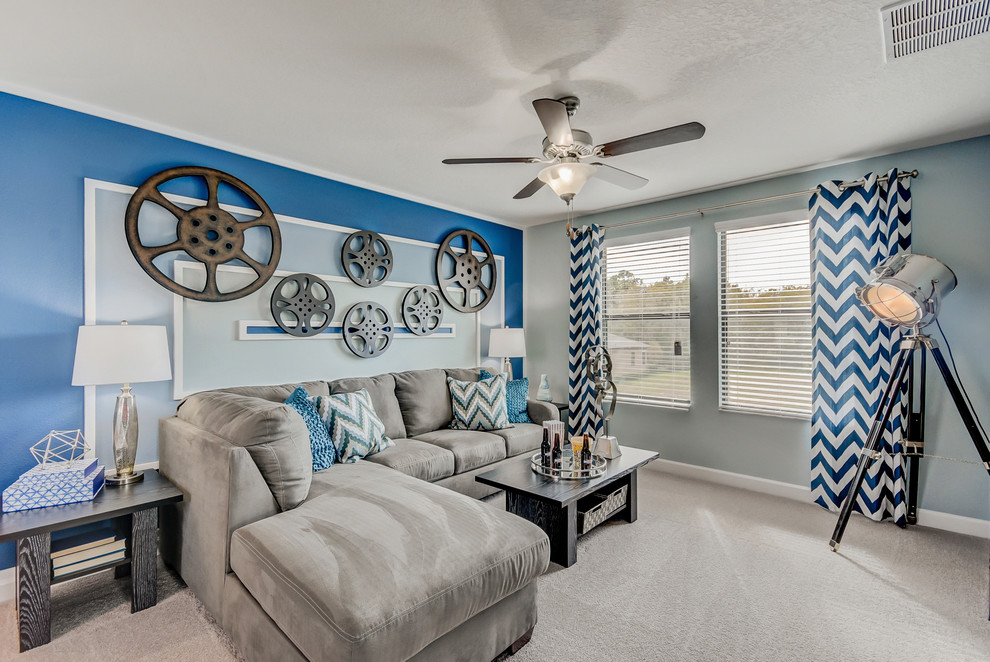 Inspiration for a transitional carpeted family room remodel in Tampa with multicolored walls