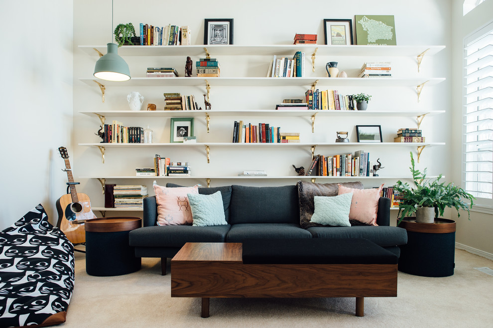 Mid-sized eclectic open concept carpeted and beige floor family room photo in Salt Lake City with white walls