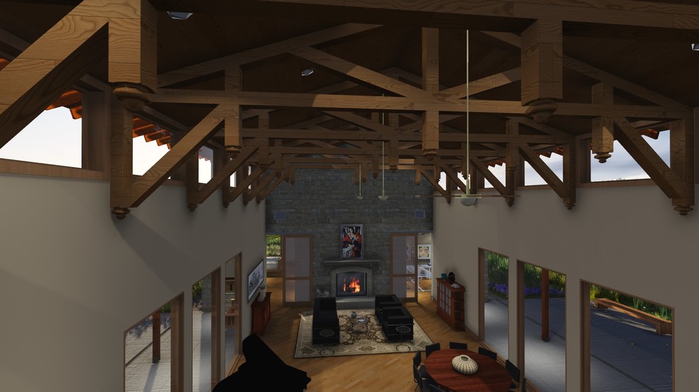 Cette image montre une salle de séjour sud-ouest américain de taille moyenne et fermée avec une cheminée standard, un manteau de cheminée en pierre et parquet en bambou.