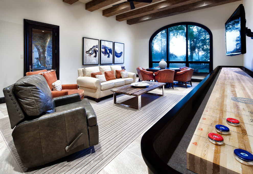 This is an example of a mediterranean games room in Austin with a game room.