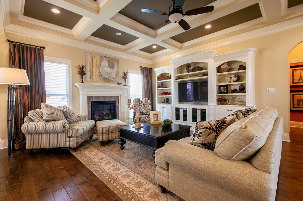 Mid-sized elegant open concept dark wood floor family room photo in Louisville with beige walls, a standard fireplace, a tile fireplace and a tv stand