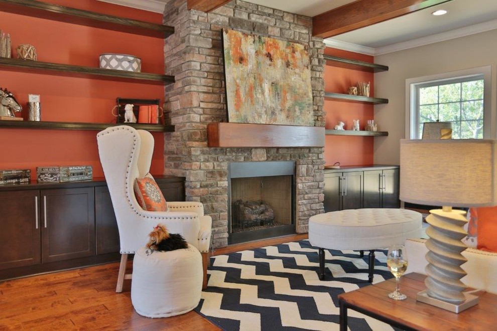 Family room - large transitional open concept family room idea in Louisville with gray walls, a standard fireplace, a stone fireplace and a wall-mounted tv