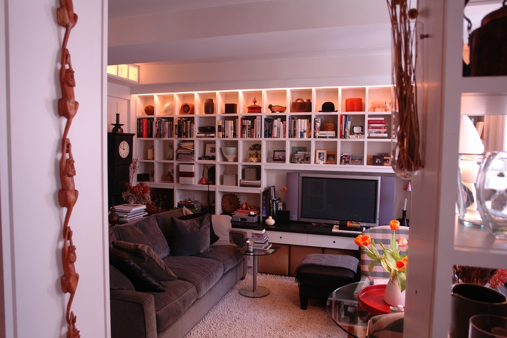 Inspiration for an eclectic family room library remodel in Boston