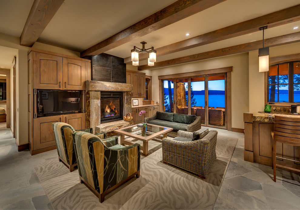 Example of a large mountain style family room design in Sacramento with a standard fireplace, a metal fireplace and a concealed tv