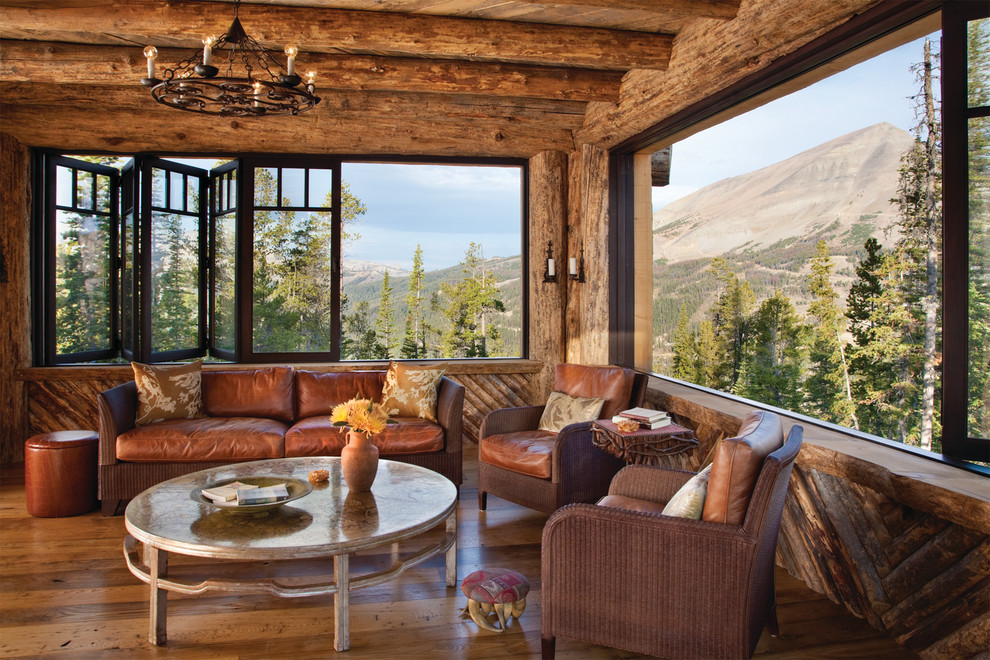 Family room - rustic medium tone wood floor family room idea in Other