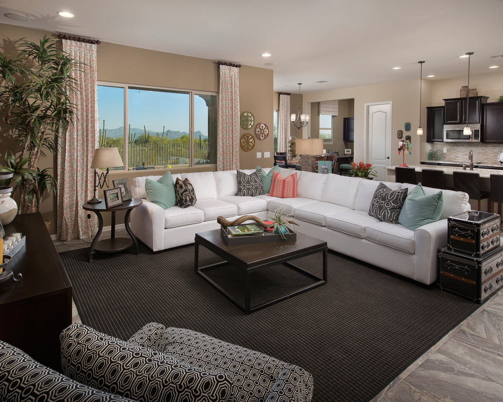 Example of a trendy open concept living room design in Phoenix with beige walls