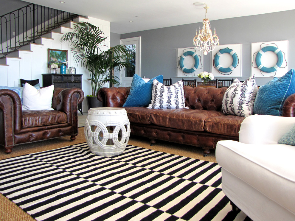 Elegant family room photo in Orange County with gray walls