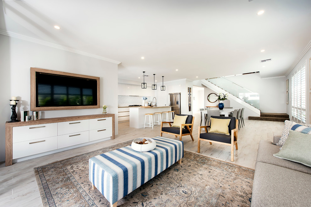 This is an example of a nautical open plan games room in Perth with white walls and ceramic flooring.