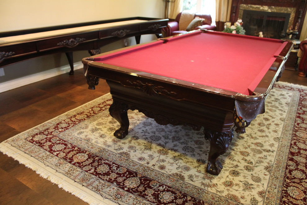 Inspiration for a medium sized victorian enclosed games room in Orange County with a game room and beige walls.