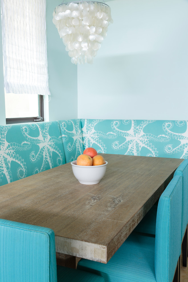This is an example of a coastal dining room in Los Angeles.