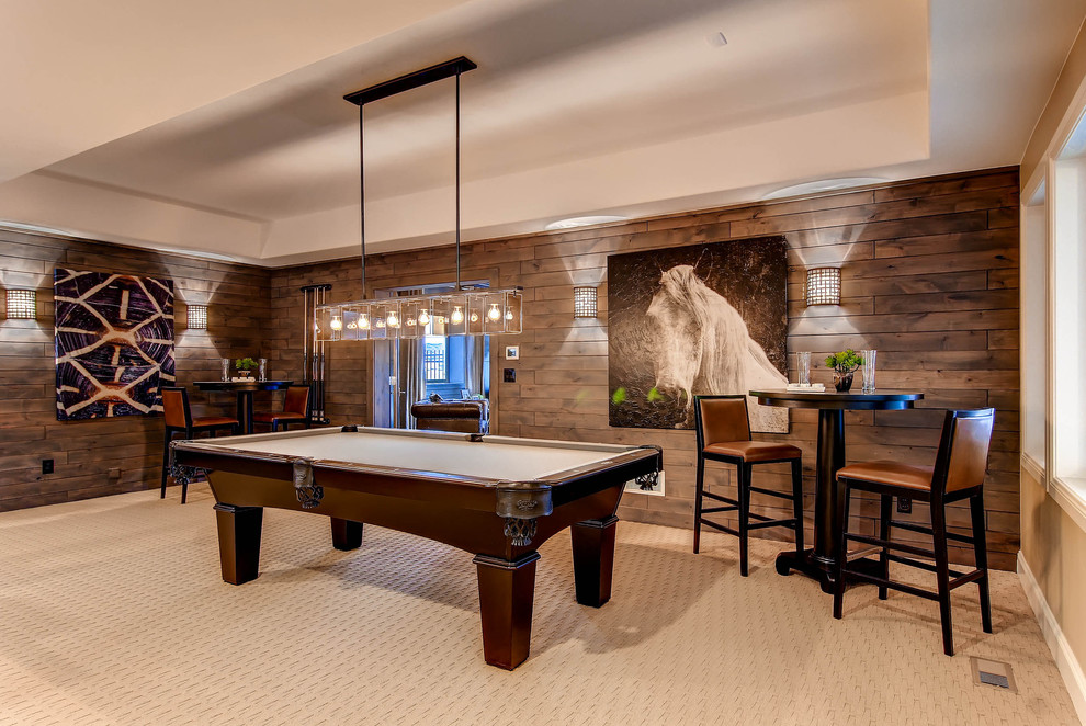 Inspiration for a rustic games room in Denver with beige walls and carpet.