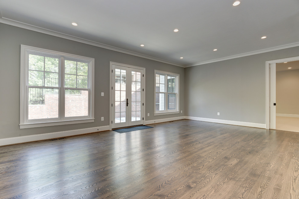 Inspiration for a large country open plan games room in DC Metro with medium hardwood flooring.