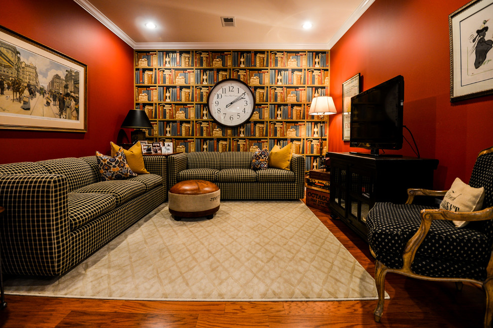 Large classic open plan games room in Baltimore with a reading nook, red walls, medium hardwood flooring and a freestanding tv.