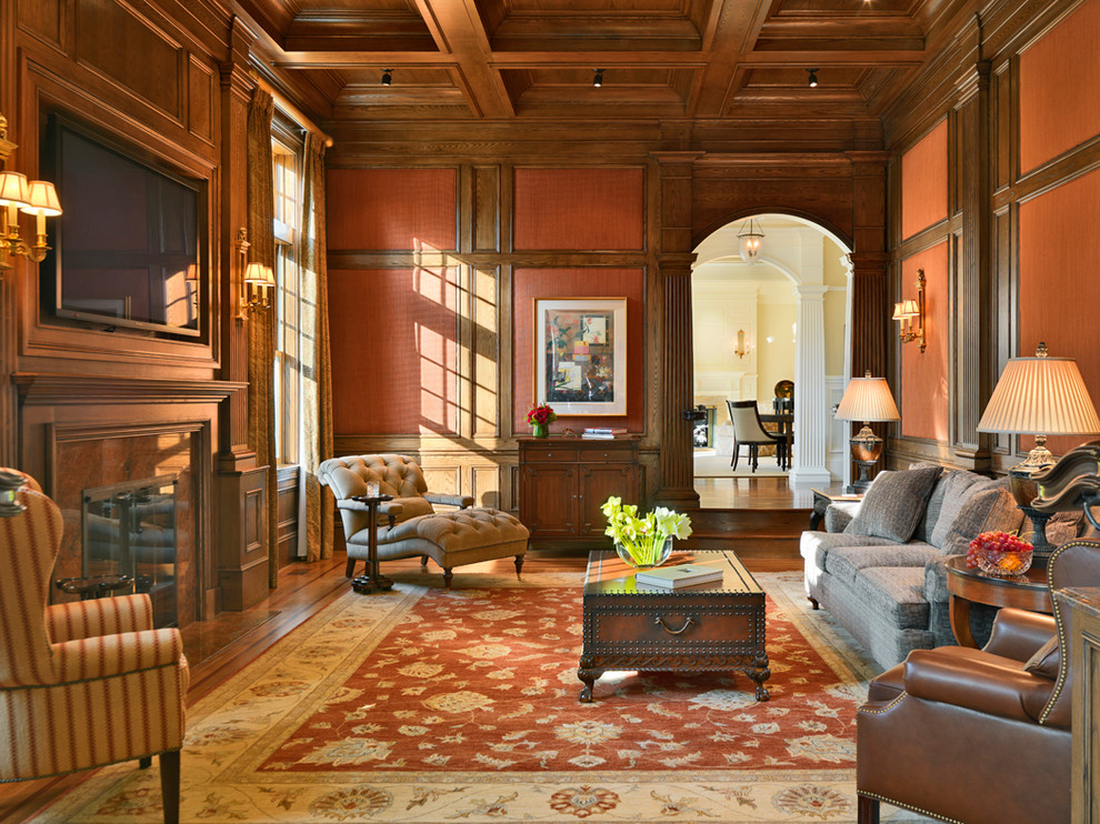 Пример оригинального дизайна: гостиная комната в классическом стиле с с книжными шкафами и полками
