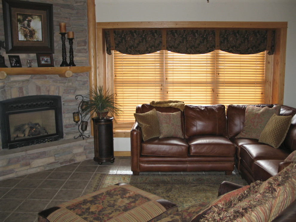 Example of a mountain style family room design in Denver