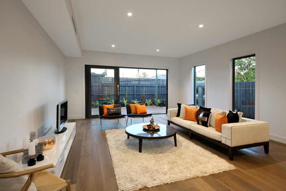 Example of a mid-sized trendy family room design in Melbourne
