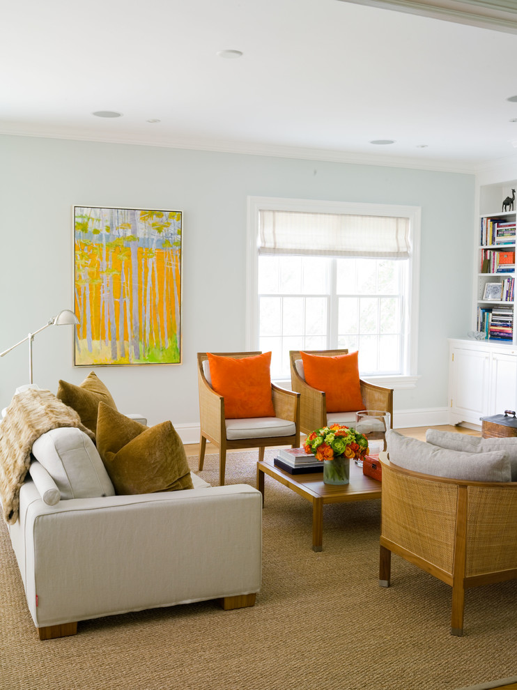 Example of a mid-sized classic enclosed family room design in New York with blue walls