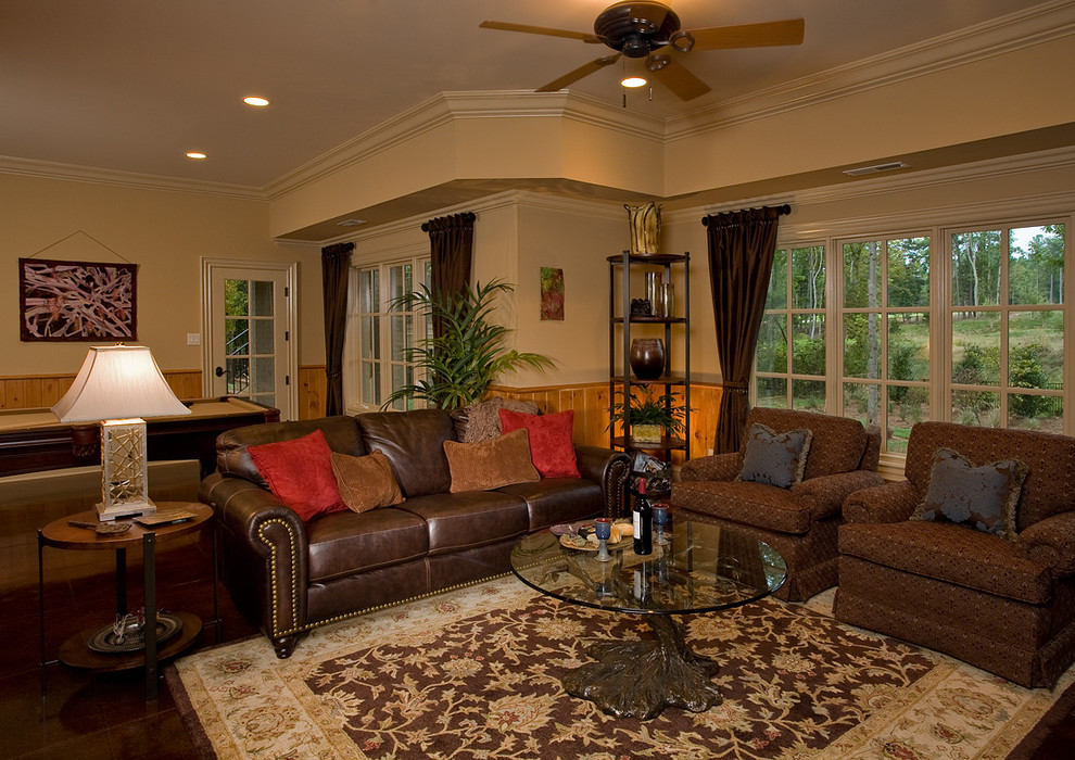 Example of a classic open concept game room design in Raleigh with beige walls