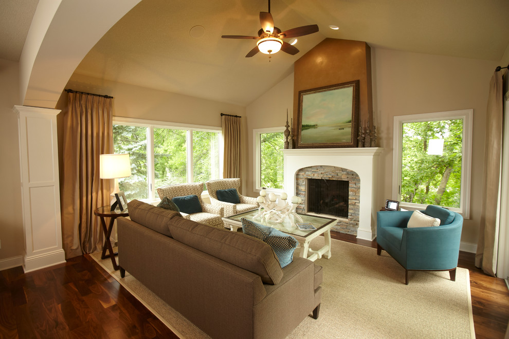 Elegant family room photo in Minneapolis with beige walls