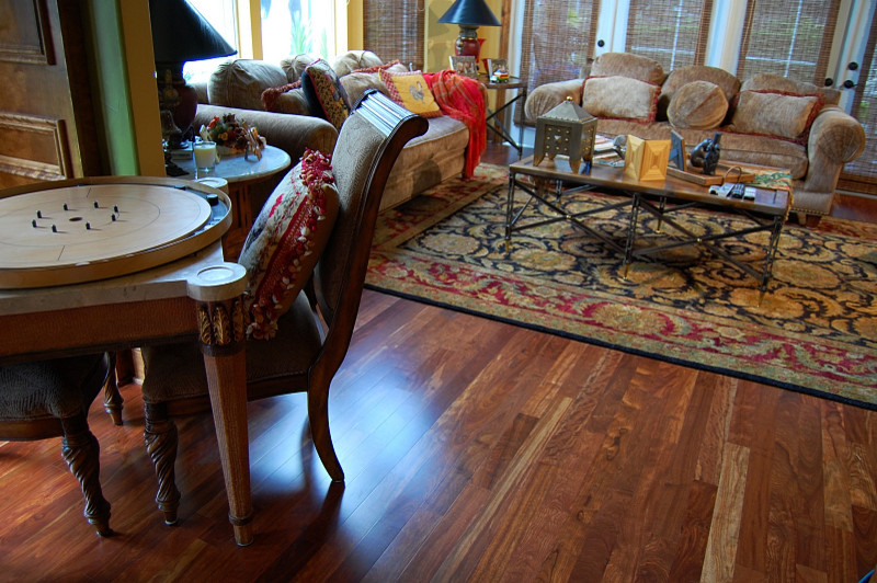 Inspiration for a large timeless medium tone wood floor and multicolored floor family room library remodel in Tampa
