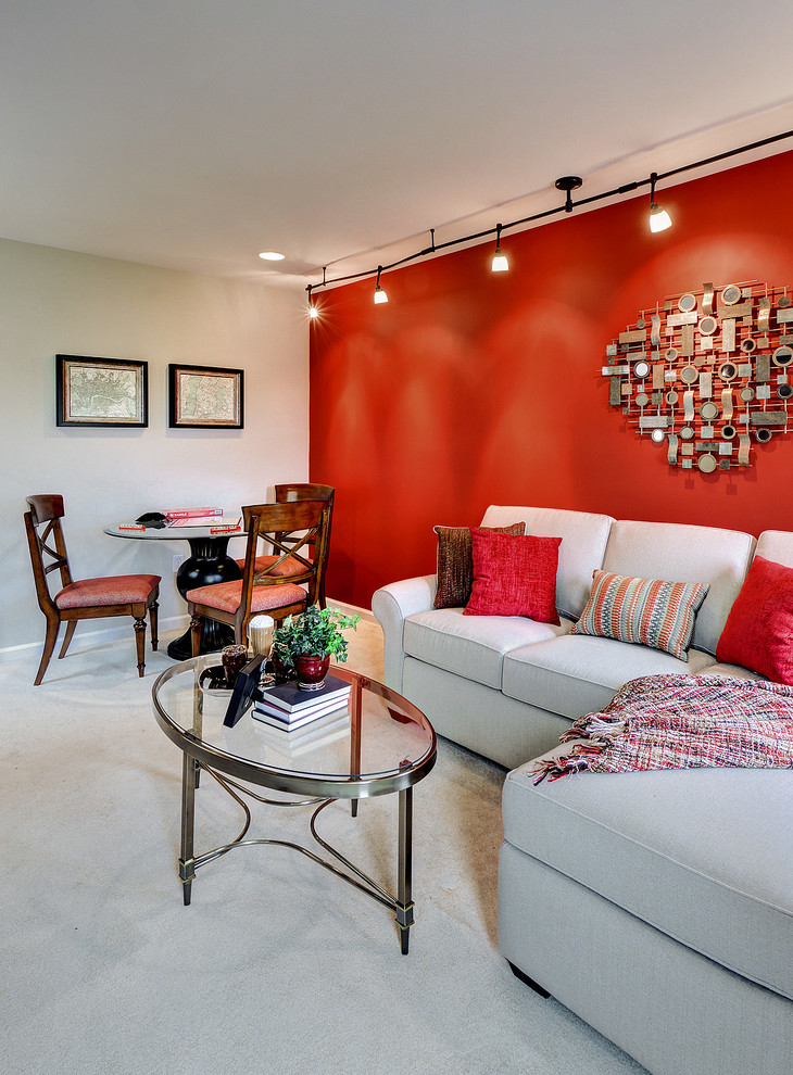 Example of a small classic carpeted game room design in Philadelphia with red walls and a wall-mounted tv