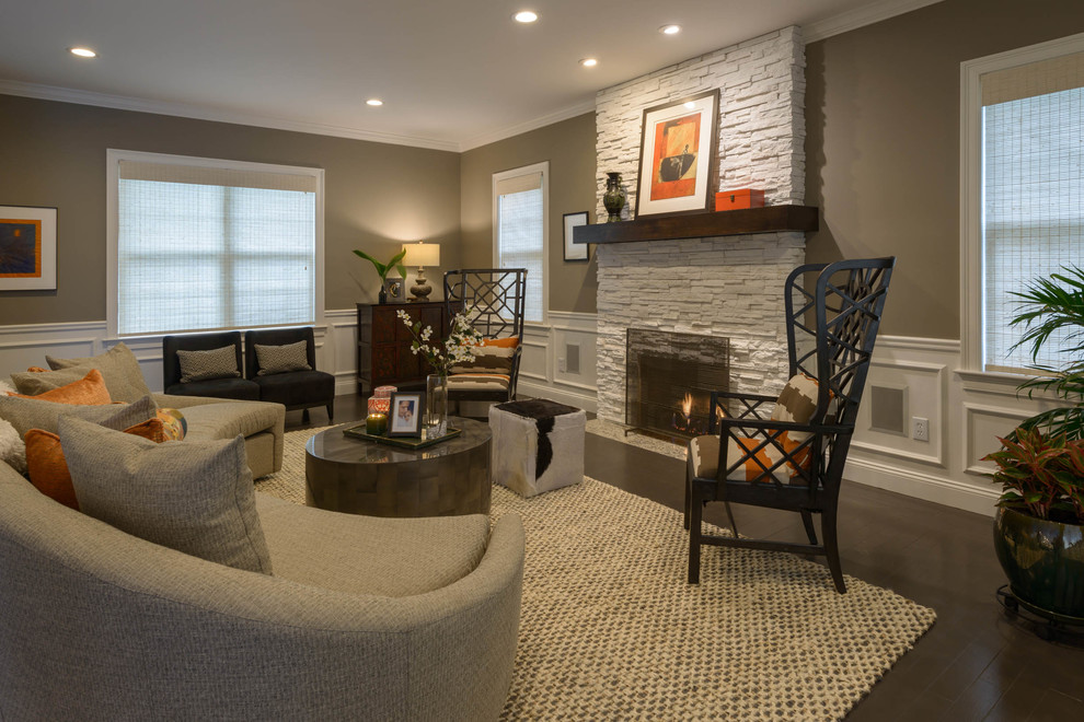 Design ideas for a medium sized traditional open plan games room in Boston with brown walls, dark hardwood flooring, a standard fireplace, a stone fireplace surround and brown floors.