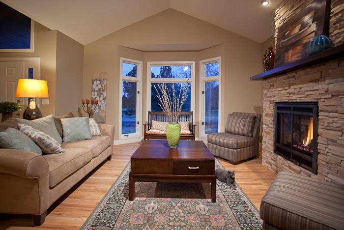 Example of a transitional family room design in Denver