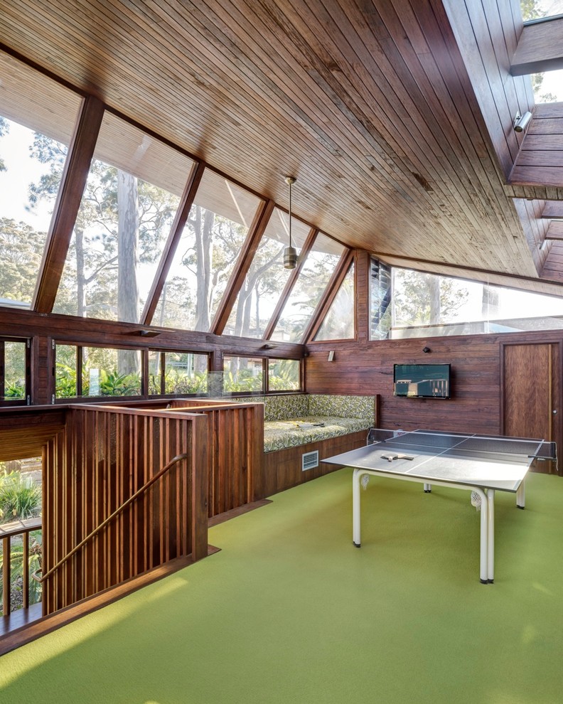 Large contemporary games room in Sydney with carpet and a game room.