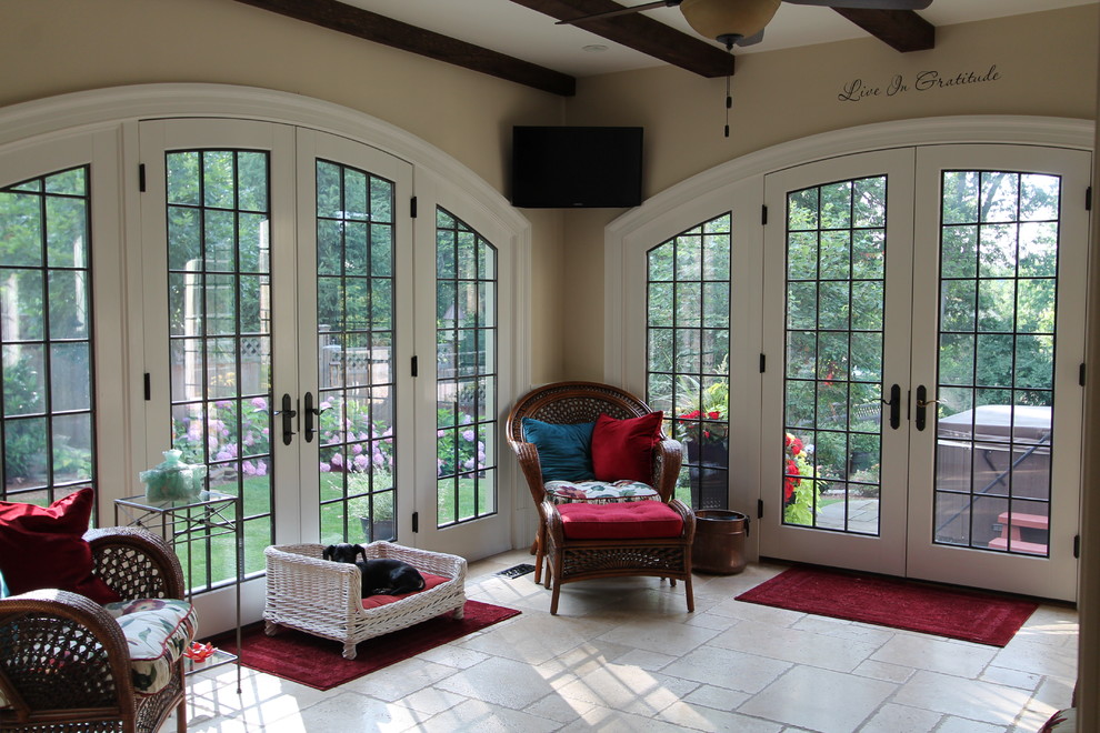 Medium sized classic conservatory in New York with limestone flooring.