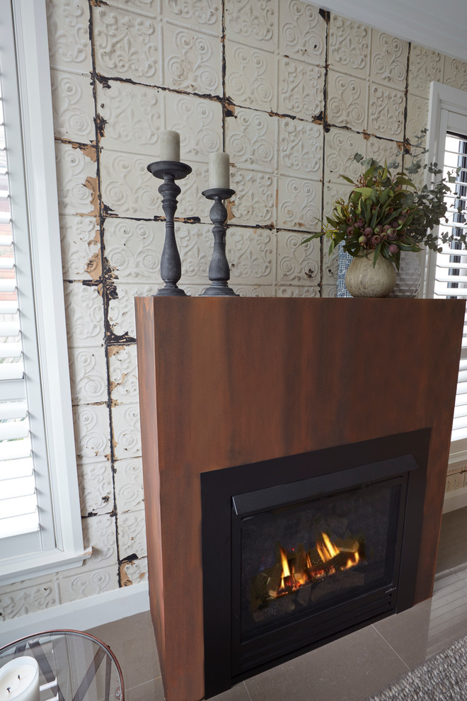 Example of a mid-sized urban open concept ceramic tile family room design in Sydney with a standard fireplace and a wall-mounted tv